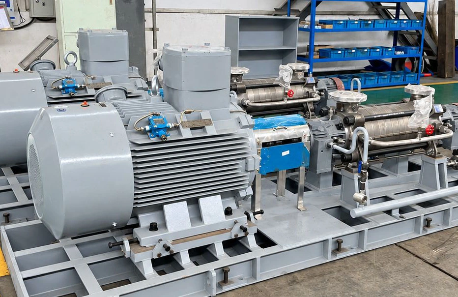 Motor-driven multistage pump packages on grey baseplates.