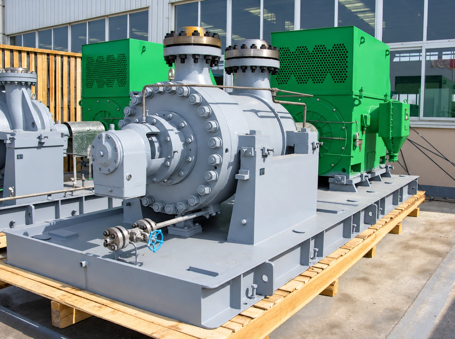 Barrel pump assembly with green motors on transport supports.