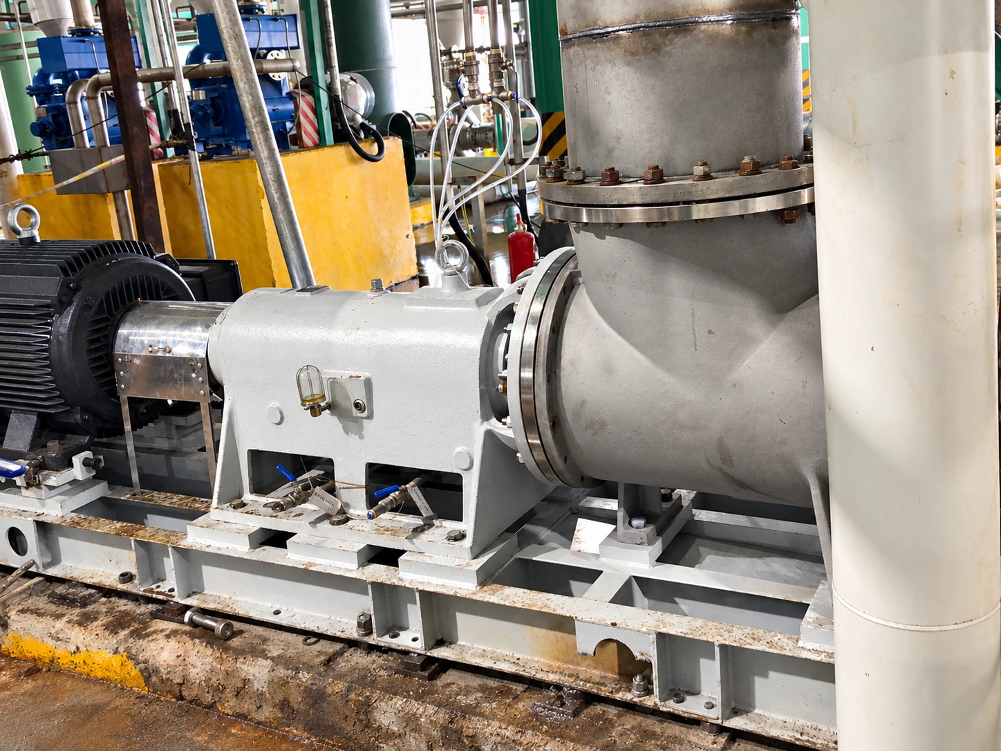 Chemical axial flow pump bearing housing, coupling guard and connected piping.